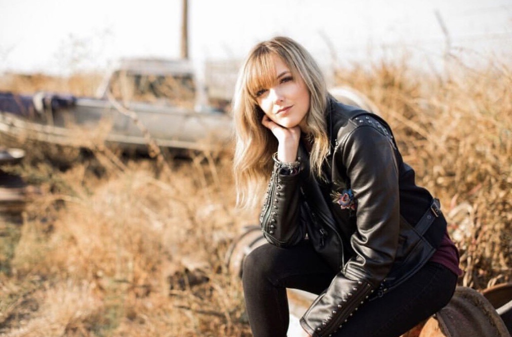 Madison Hudson in a field